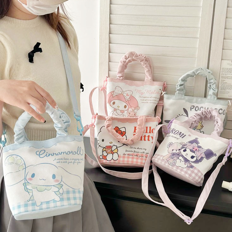 日版Sanrio正品Kitty/Kuromi斜挎手提收纳包：萌力全开，让你心动不已！