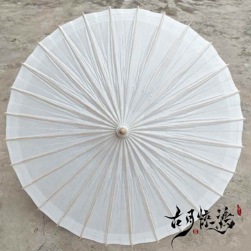 古月惊鸿油纸伞：穿越时空的古风拍照神器，一秒变复古大片！