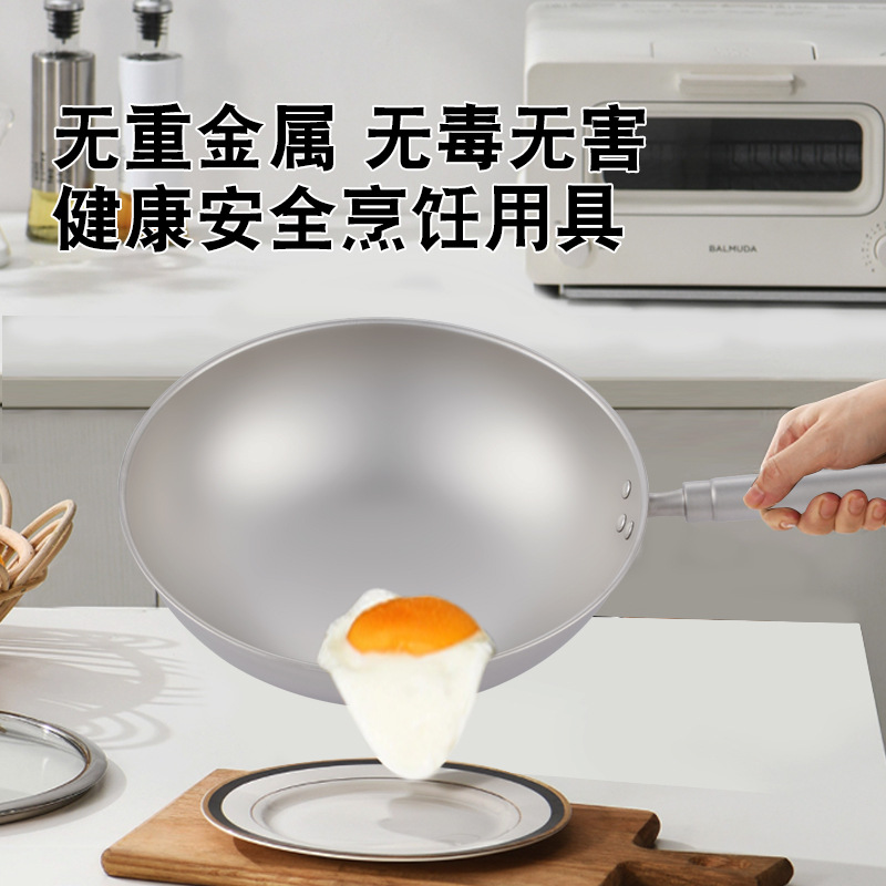 华炊传统双耳炒锅：厨房里的钛合金艺术品，炒出家的味道