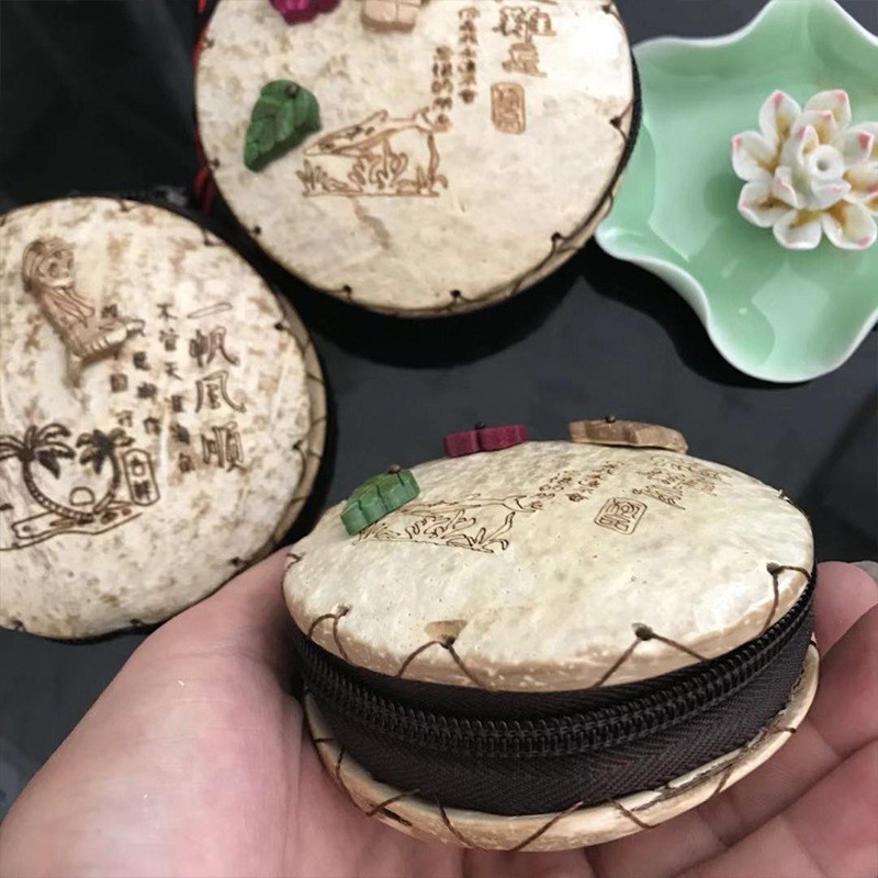 海南椰壳太阳花包包：创意与自然的完美碰撞，手挂短绳零钱包，来样订做，萌翻你的礼物清单！