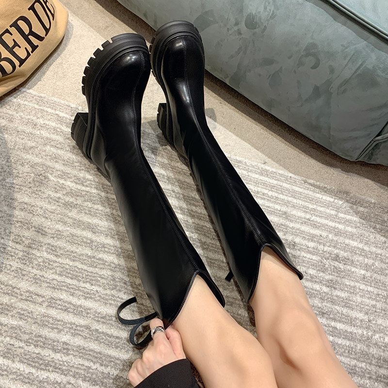 新款长筒靴怎么搭配才时髦又显高？