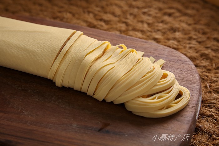 正宗东北手工干豆腐卤水千张：如何挑选新鲜美味的500g/袋真空顺丰包邮豆腐皮?