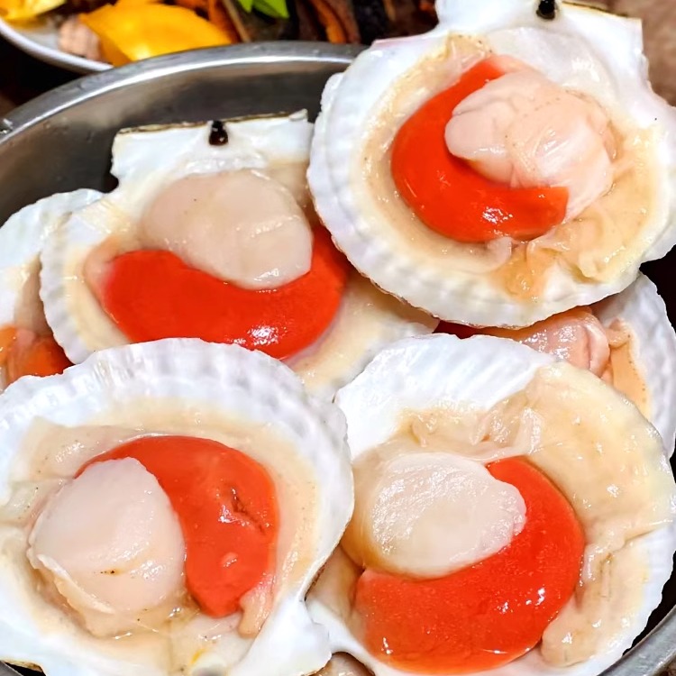 大连海鲜盛宴：蒜蓉夏夷贝扇贝的诱惑，你准备好了吗？